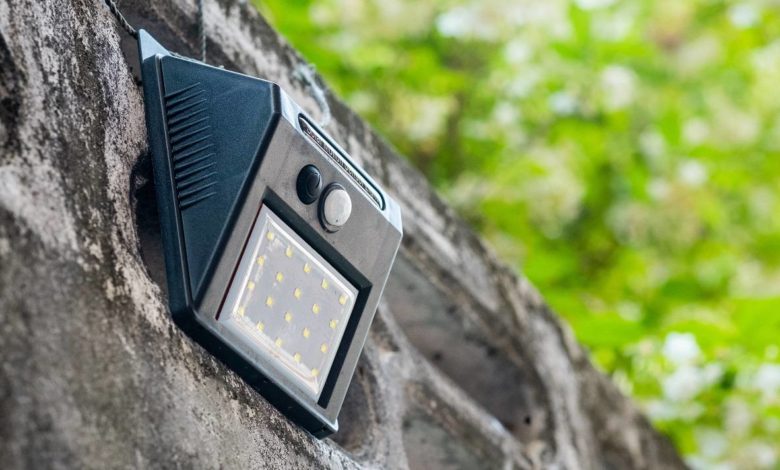 outdoor solar powered motion sensor on the wall